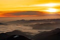 Mountain landscape with winter fog at sunse of Ceahlau, Romaniat Royalty Free Stock Photo