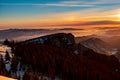 Mountain landscape with winter fog at sunse of Ceahlau, Romaniat Royalty Free Stock Photo