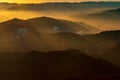 Mountain landscape with winter fog at sunse of Ceahlau, Romaniat Royalty Free Stock Photo