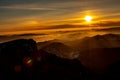 Mountain landscape with winter fog at sunse of Ceahlau, Romaniat Royalty Free Stock Photo