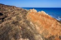 Mountain landslide in an environmentally hazardous area. Large crack in ground, descent of large layers of dirt. Deadly danger at