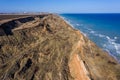 Mountain landslide in an environmentally hazardous area. Large crack in ground, descent of large layers of dirt. Deadly danger at