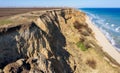 Mountain landslide in an environmentally hazardous area. Large crack in ground, descent of large layers of dirt. Deadly danger at