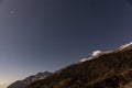 Mountain with little snow on the top with stars in the night at Lachen in North Sikkim, India Royalty Free Stock Photo