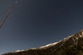 Mountain with little snow on the top with stars in the night at Lachen in North Sikkim, India Royalty Free Stock Photo