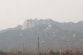 Mountain look blurred due to dense fine dust. Air pollution in Seoul