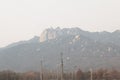 Mountain look blurred due to dense fine dust. Air pollution in Seoul