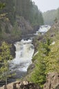 Mountain low waterfall with a rapid current