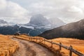 Mountain meadow and houses in Gardena valley and Seceda peak , background Alpe di Siusi or Seiser Alm in the with Province of Royalty Free Stock Photo