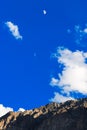 The mountain and the moon on blue sky Royalty Free Stock Photo