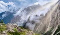 Mountain panorama in the Dolomite Alps, Italy. Mountain ridge in the clouds. Beautiful landscape at the summer time. Royalty Free Stock Photo