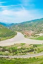 Mountain panorama with green field and blue sky Royalty Free Stock Photo