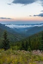 Mountain panorama over the clouds sunset Royalty Free Stock Photo