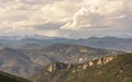 Mountain panorama over the clouds sunset Royalty Free Stock Photo