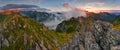 Sunset on the ridge of the High Tatras. Red hills, Swinica, Giewont, fog in the valley. Discover the beauty of nature. Royalty Free Stock Photo