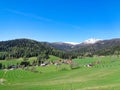 a mountain pasture in austria spring time blue sky Royalty Free Stock Photo