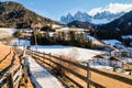 Mountain path and long wooden fence in Dolomite Alps Royalty Free Stock Photo