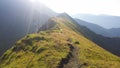 Mountain path and marking pole that leads to Bucsoiu peak Royalty Free Stock Photo