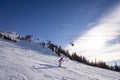 Mountain peak and chair lift with skiers, winter landscape, ski resort, Whistler BC. Royalty Free Stock Photo