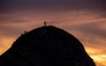 mountain peak with cross and people during sunset silhouette dramatic sunset brienzer rothorn switzerland