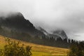 Mountain peak in fog Royalty Free Stock Photo