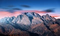 Mountain peak lighted by moonlight in autumn at night Royalty Free Stock Photo