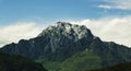 Mountain peak white clouds Royalty Free Stock Photo