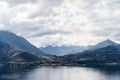 Mountain peaks over the town of Menaggio. Lake Como, Italy Royalty Free Stock Photo