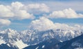 Mountain peaks snow and clouds background Royalty Free Stock Photo