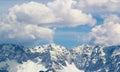 Mountain peaks snow and clouds background Royalty Free Stock Photo