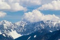 Mountain peaks snow and clouds background Royalty Free Stock Photo