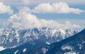 Mountain peaks snow and clouds background Royalty Free Stock Photo