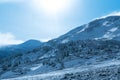 Mountain peaks in the sun