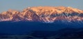 Mountain peaks at sunrise, bright view, panorama