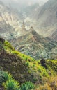 Mountain peaks of Xo-Xo valley in sun light. Local village in the valley. Many agava plants grow on the steep stony Royalty Free Stock Photo