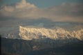 mountain pick with snow on top clouds ice winter background in mitsikeli mountain grreece Royalty Free Stock Photo