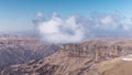 Mountain plateaus with moving clouds. Time lapse