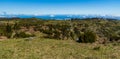 Mountain pleateau with smaller hills and road bellow Pico do Areeiro hill in Madeira Royalty Free Stock Photo