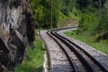 Mountain railway with additional rail for cogwheel,