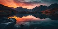 Mountain range at dusk with the sunset sky reflecting on mountain lake. AI generated. Royalty Free Stock Photo