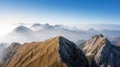 Mountain range horizon in the morning mist, and the rising sun