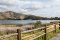 Mountain Range, Lake and Fence in Chula Vista, California Royalty Free Stock Photo