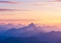 Mountain range at sunset with a panoramic view of multiple Royalty Free Stock Photo