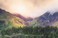 Mountain range with thick clouds above in the Denali National Park Royalty Free Stock Photo