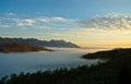 Mountain range and a valley of fog at daybreak