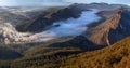 Mountain ranges aerial view from above with mist early morning Royalty Free Stock Photo