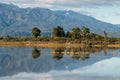 Mountain ranges in Southern Alps reflecting on lake Royalty Free Stock Photo