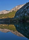 Mountain reflection in water Royalty Free Stock Photo