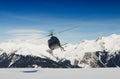 Mountain rescue helicopter in flight