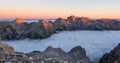 Mountain ridge with peaks illuminated by morning sun Royalty Free Stock Photo